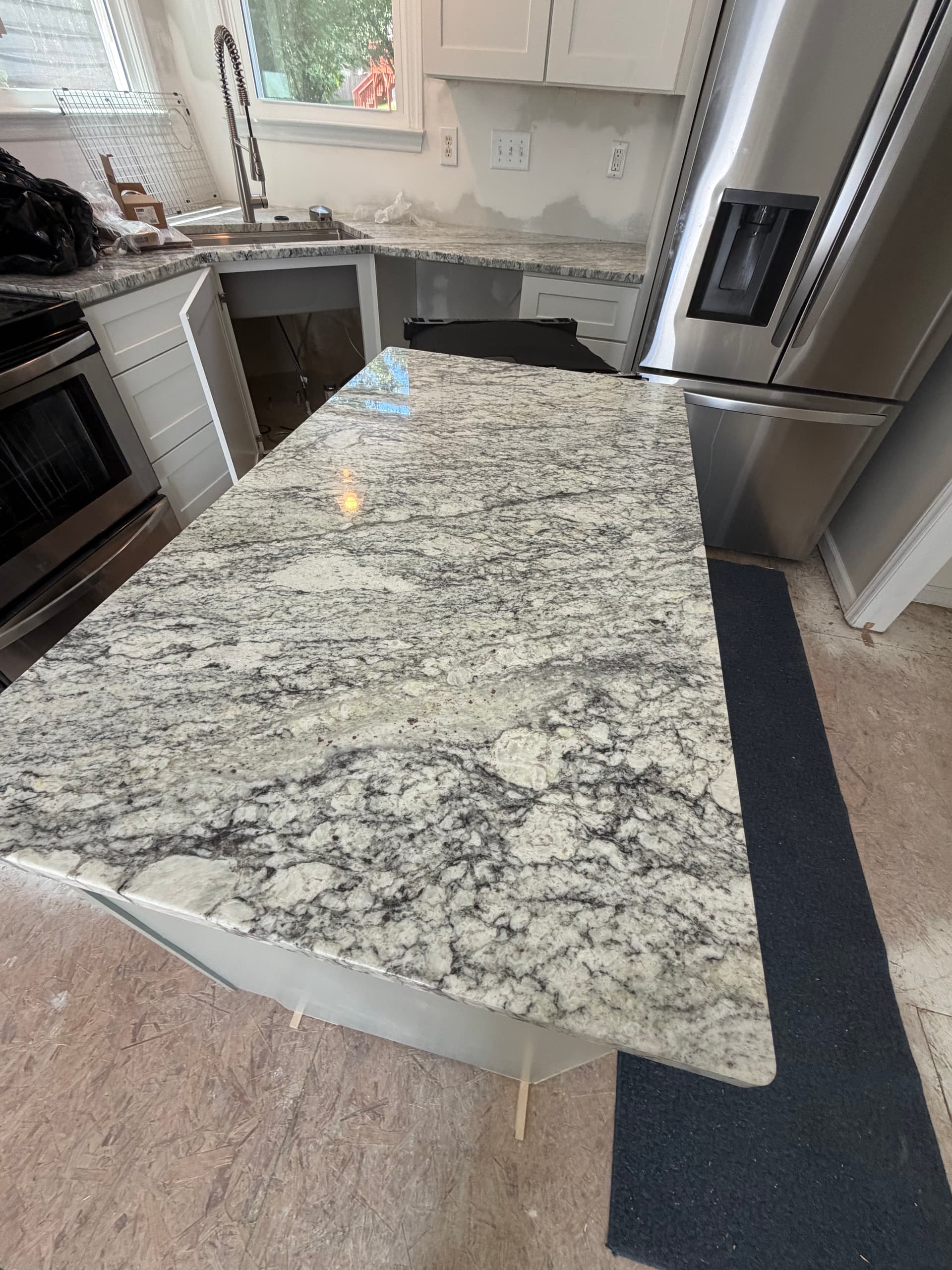 Gallery photos for Fresh Stone Countertops Dropped Into This Kitchen Remodel: Image #1