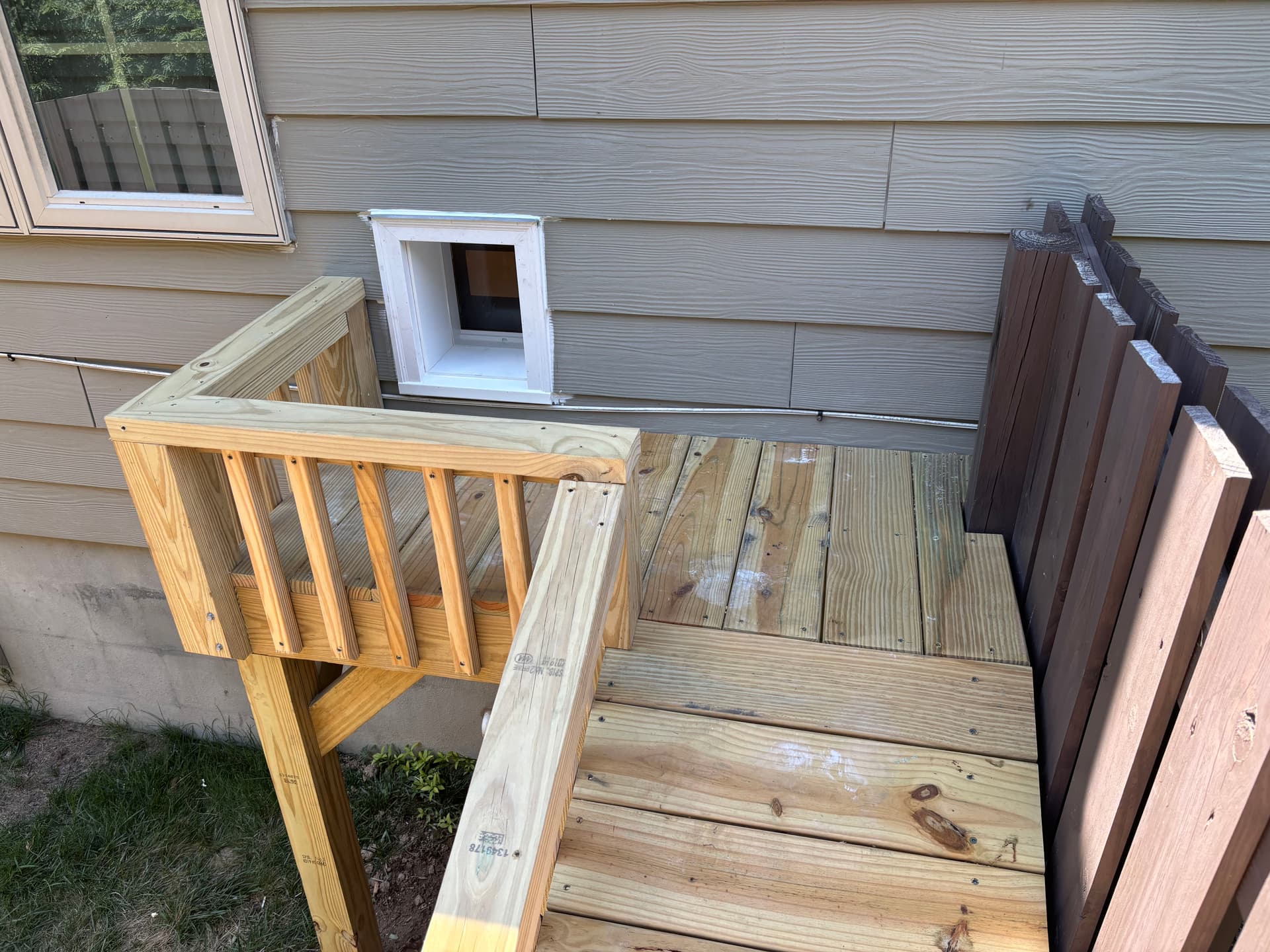 Custom Doggy Door, Ramp, and Secure Side Yard Build image