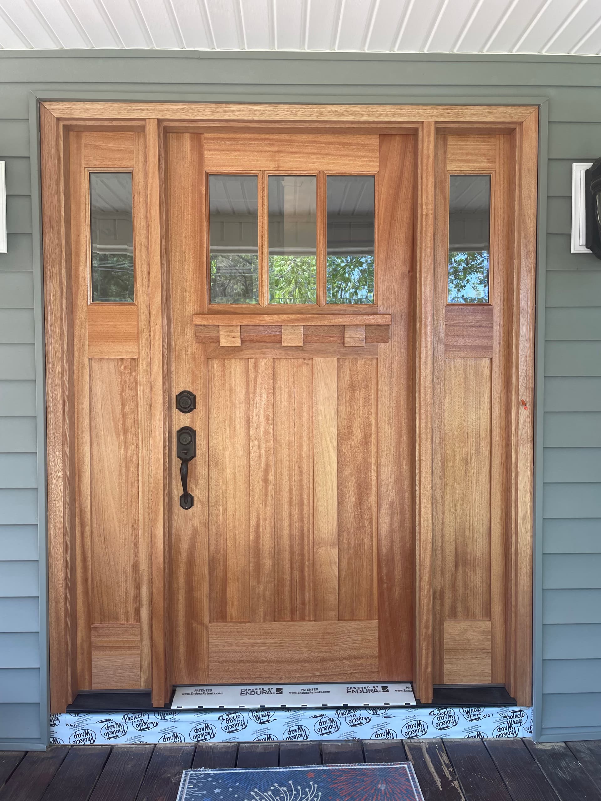 Mahogany Craftsman Entry Door With Sidelights Installed image